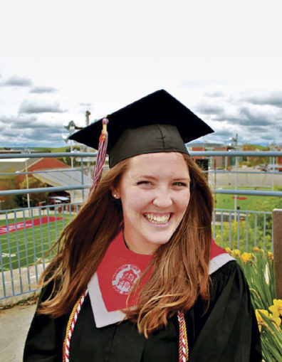 Becca Prescott in WSU graduation robes