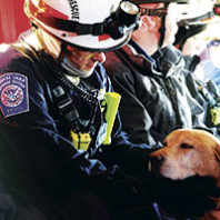 Dominic Dipietco with search dog Jeb