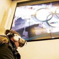 A WSU student takes a virtual trip to the 2018 Winter Olympics. Photo Robert Hubner
