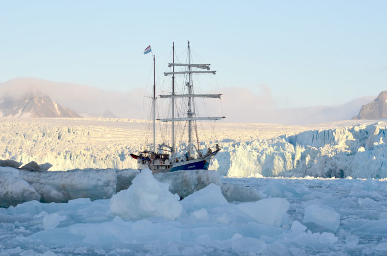Tall ship Antigua in a fjord near Svalbard. Photo Debbie Lee