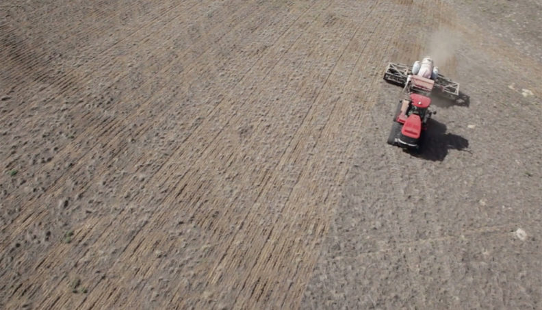 Tractor doing direct seeding. Video frame Pond5