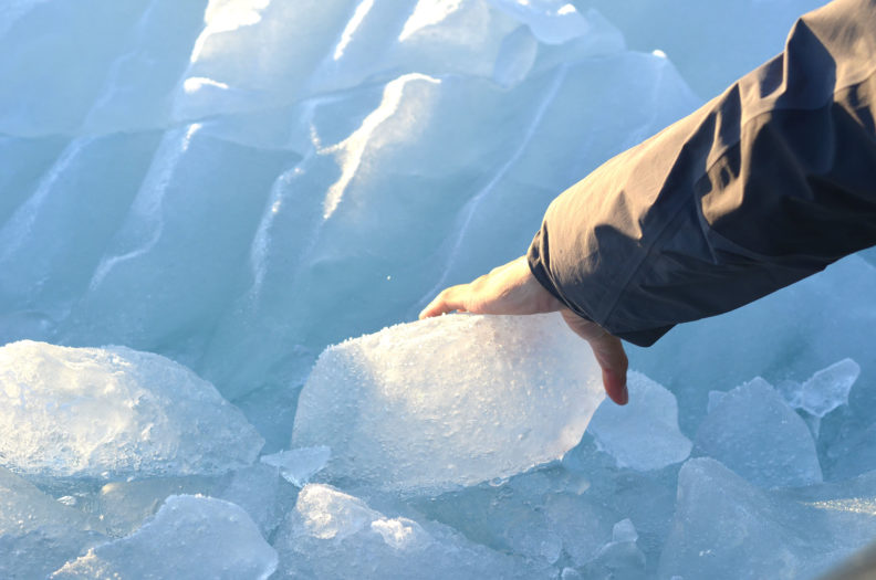 Holding a chunk of ice. Photo Debbie Lee