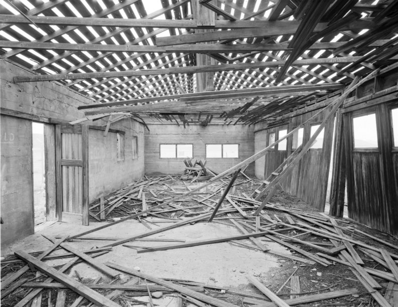 Interior of the Bruggemann Warehouse on the Hanford Reservation with collapsed beams