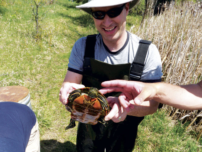 Jesse Brunner with painted turtle