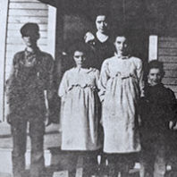 Five children stand in front of Riviera School circa 1917