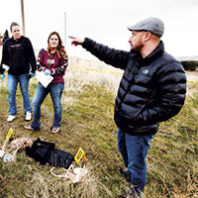 Matt DeGarmo critiquing forensic science students on their crime scene investigation in a field lab at Blue Mountain Community College in Pendleton, Oregon.