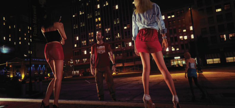 Grand Theft Auto 5 screenshot of man looking at two women in short skirts