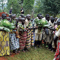 Kids in Burundi with produce from their gardens meet WSU and 4-H guests (Courtesy Pat Munts)