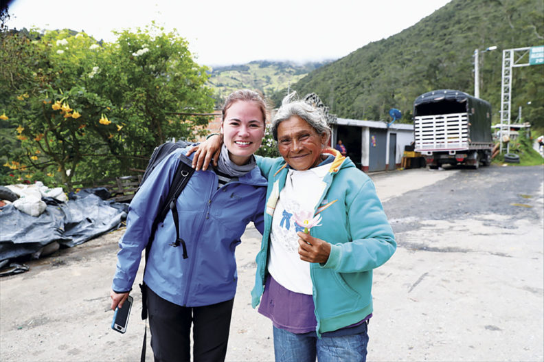 Andrea Castillo in Colombia with a refugee from Venezuela