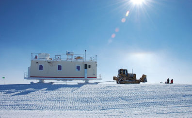 Walden’s mobile research facility in Greenland being pulled by a tractor