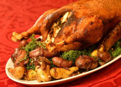 Roast goose with potatoes and Brussels sprouts. Photo Shelly Hanks