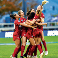 WSU team celebrates a goal at Women's Soccer College Cup 2019