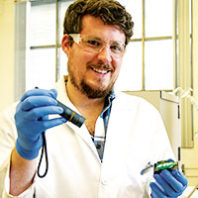 Travis Olds with light and mineral