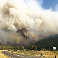 Smoke rises from the Carpenter Road Fire in Washington