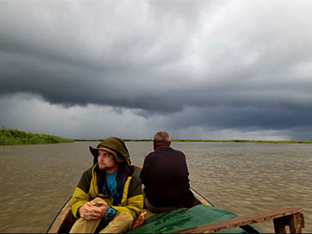 Man in a boat in Papua New Guinea