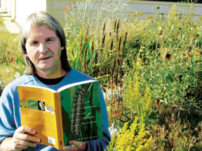 David James with his book Life Histories of Cascadia Butterflies