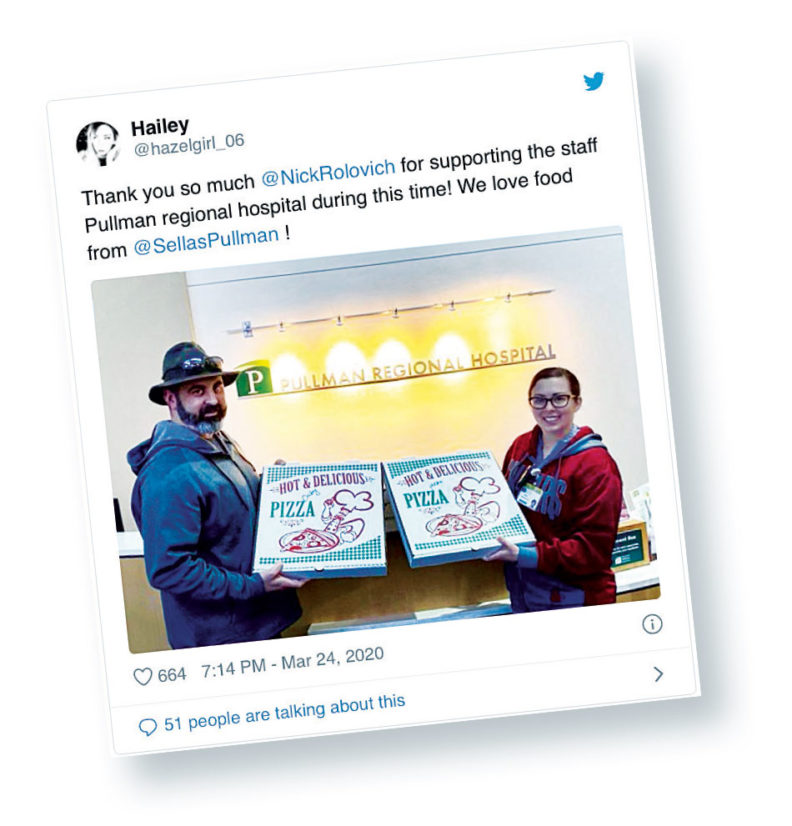 Instagram of Nick Rolovich giving pizza