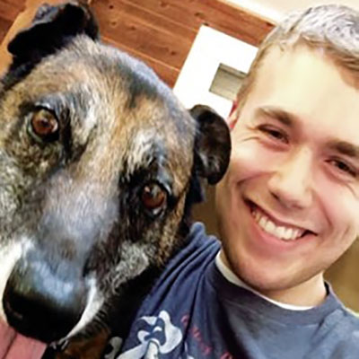 Miles Roberts with his dog