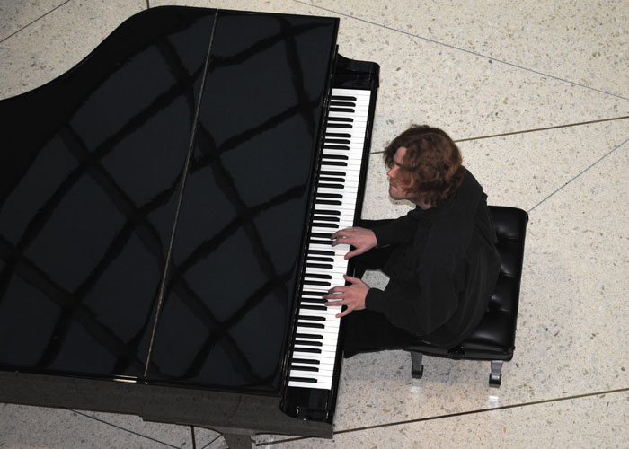 Charles Wicklander plays piano