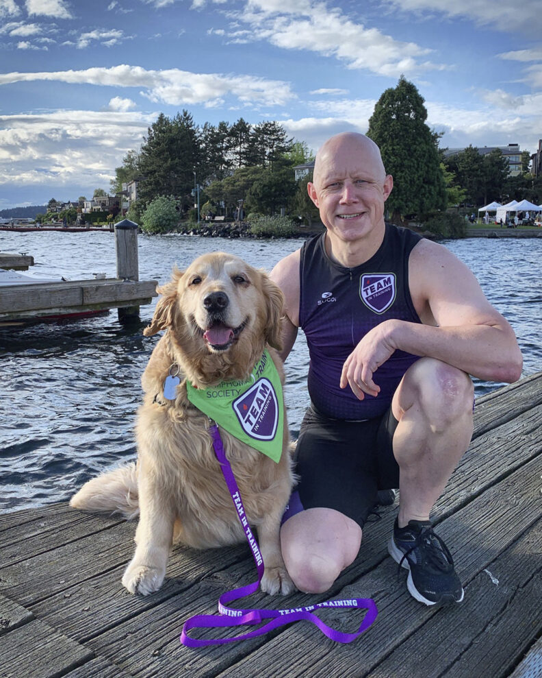 Dash Dog and Ande Edlund on a pier