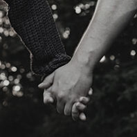 hand holding in black and white