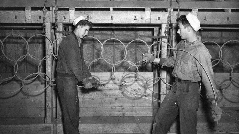 US Navy sailors working on anti-submarine nets