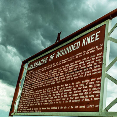 Interpretive sign at the site of the Wounded Knee massacre