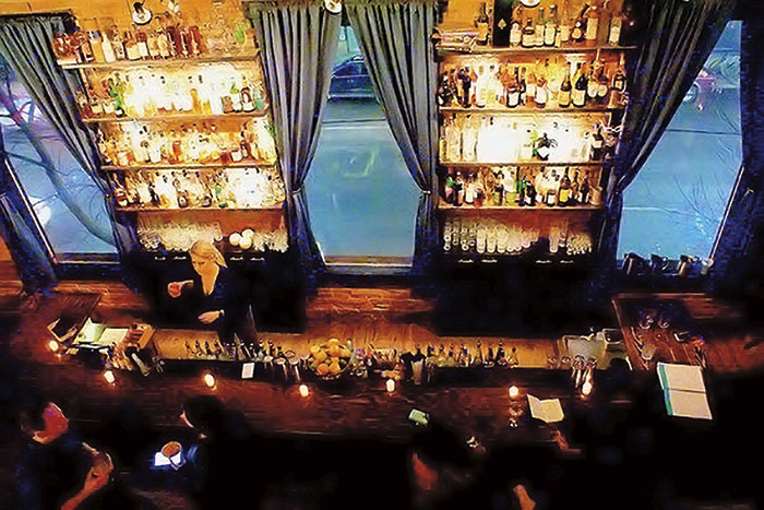 Blake (Loos) Preston behind the bar at Etsi Bravo