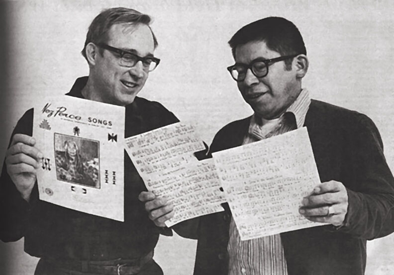 Loran Olsen and Ron Halfmoon check Nez Perce songbook in 1972