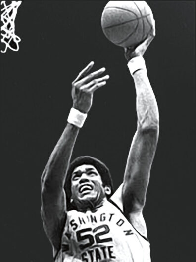 James Donaldson takes the basketball up for a dunk while playing for Washington State University in the 1970s
