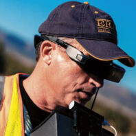 David Thirtyacre monitors a drone through VR glasses.