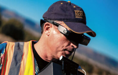 David Thirtyacre monitors a drone through VR glasses.