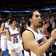 Derrick Low, clapping, leads the victorious Cougs after defeating Notre Dame in the 2007 NCAA Tournament