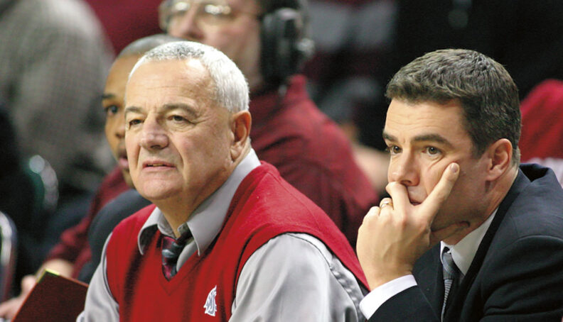 Dick and Tony Bennett watch the Cougar men’s basketball team play in 2004.