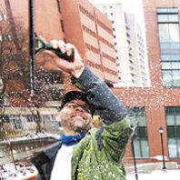 Joe Beck at Washington State University Pullman cleans a window