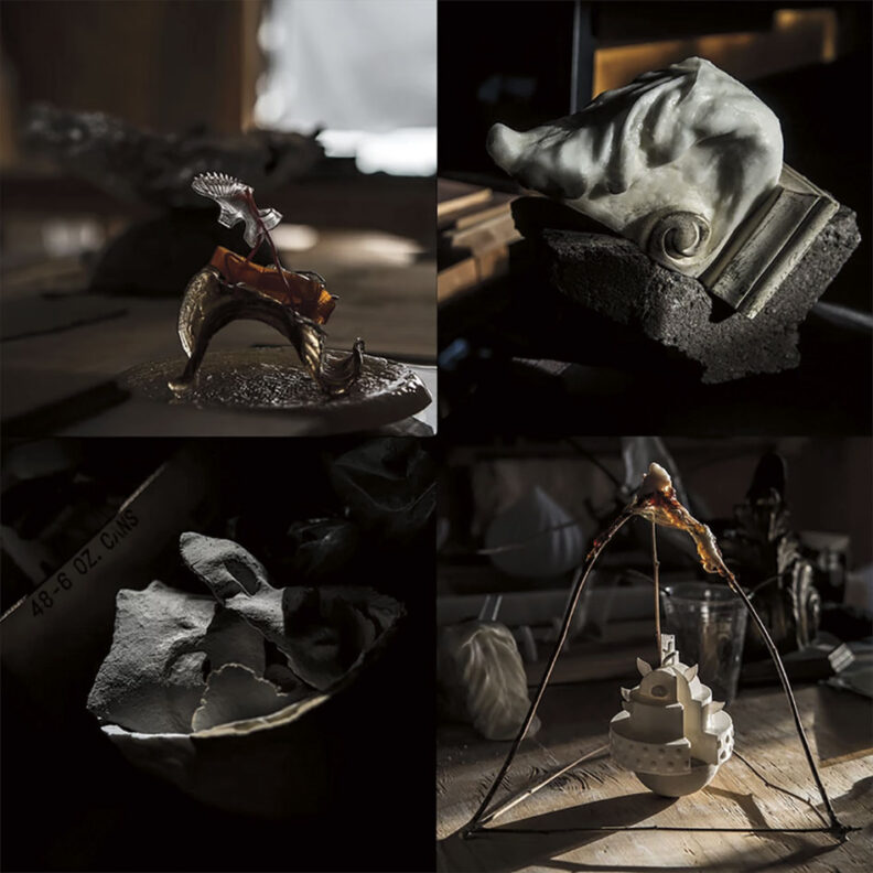 Four sculptures made of metal and other materials in abstract shapes