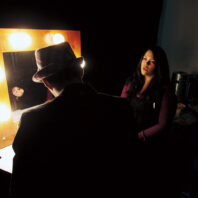 Doneen Arquines in a dressing room talks to talent for TV show Top Chef