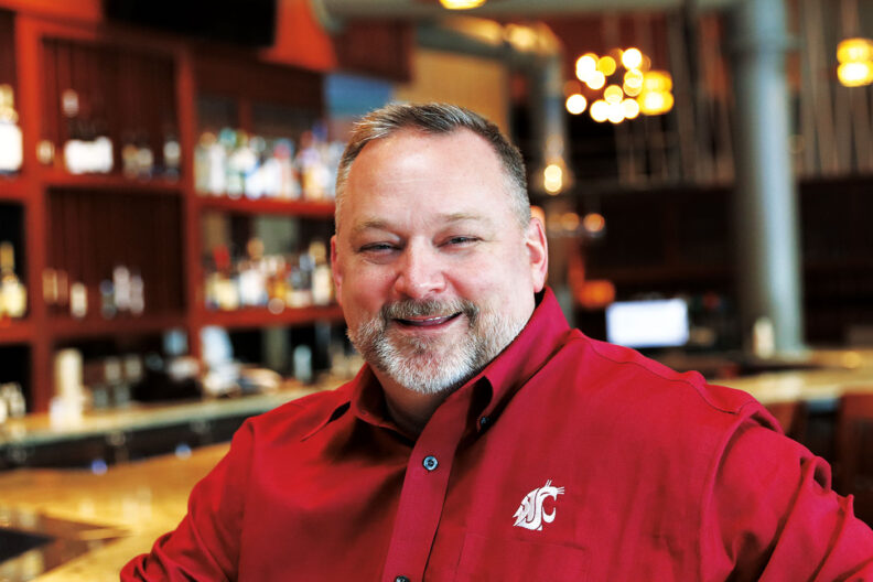 Anthony Anton sits at the bar in a restaurant