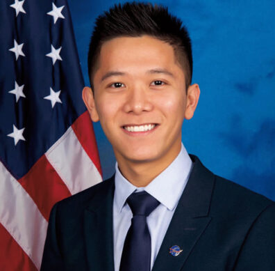 Nam H. Nguyen portrait in front of a US flag