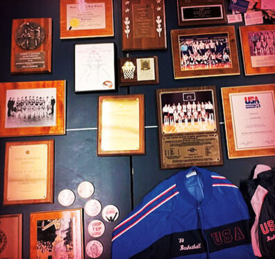 Collection of photos, plaques and certificates belonging to Coach George Raveling