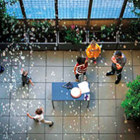 Looking down on kids playing and adults in a courtyard of Capitol Hill Urban Cohousing in Seattle