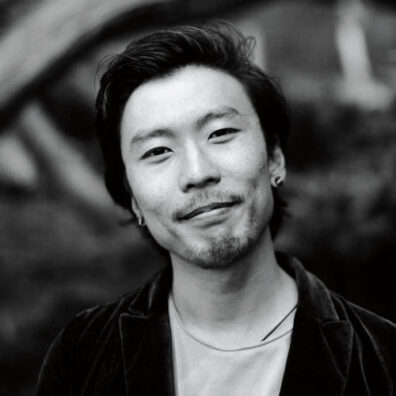 Profile of Scott Keoni Shigeoka in black and white