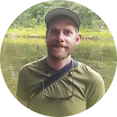 Joey Hulbert in front of a river