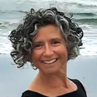 Profile of Jolie Kaytes at a beach