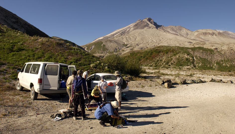 At the trailhead leading onto the pumice plain, Bishop and his crew prepare for the hike in to examine test plots.
