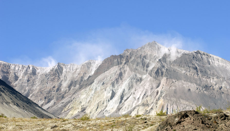 Late morning winds blow plumes of volcanic dust off the rim of the St. Helens crater.