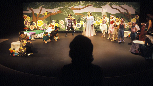 The rehearsal continues under Sherry Schreck's watchful eye