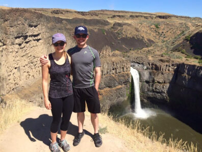 woman and man in front of Palouse Falls