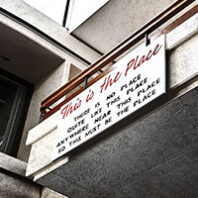 Sign in WSU Fine Arts Building reads This is the Place