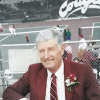 Profile of Rex Davis in front of WSU tennis courts